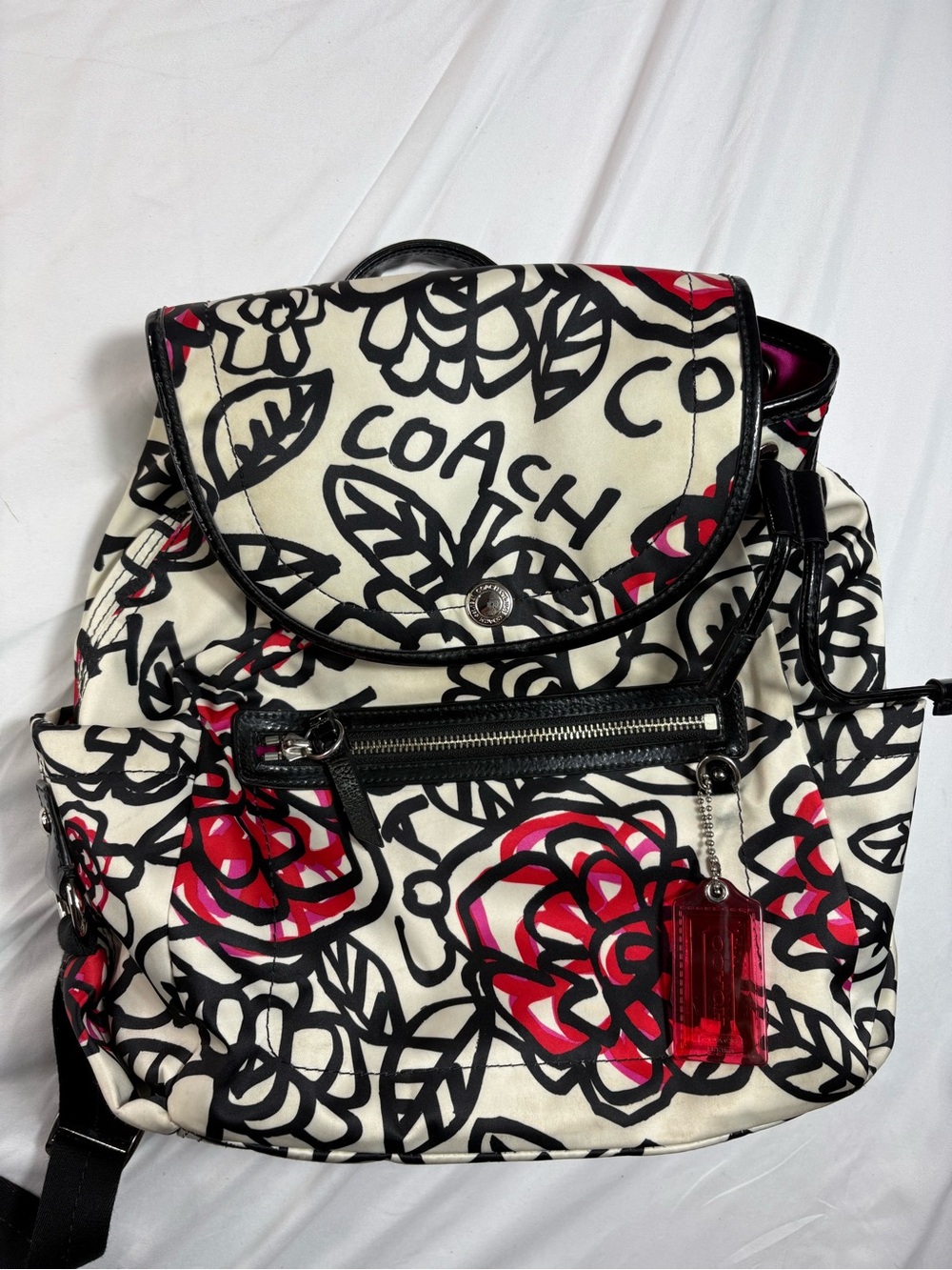 Coach poppy graffiti floral black pink backpack.